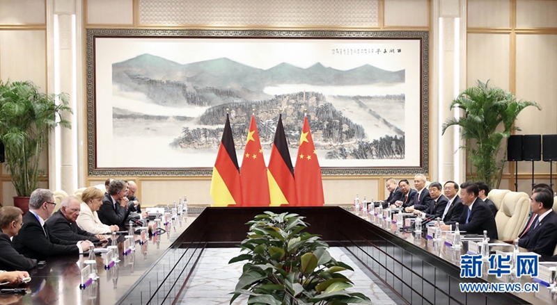 Xi Jinping trifft Angela Merkel