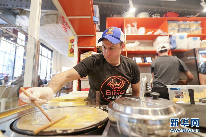 US-Amerikaner verkauft chinesische Pfannkuchen in New York
