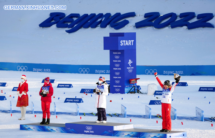 Fotoreportage: Skilangläuferin aus Norwegen gewinnt erste Goldmedaille bei Beijing 2022