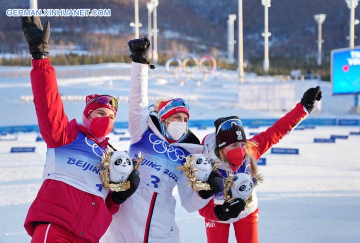 Fotoreportage: Skilangläuferin aus Norwegen gewinnt erste Goldmedaille bei Beijing 2022